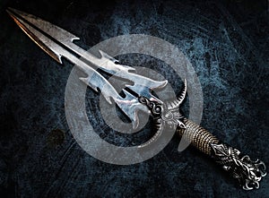 Fantasy dark blade over grunge blue background