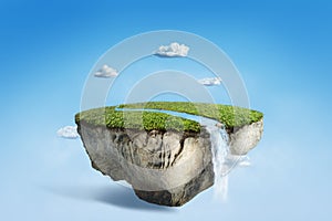 Fantasy floating island with river stream on green grass photo