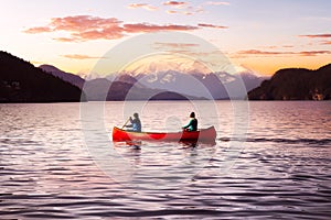 Fantasy Image Composite of Adventurous People on a Wooden Red Canoe