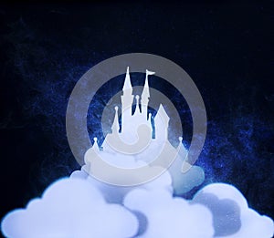 Fantasy paper art castle in the paper sky on galaxy background