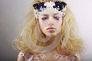 Fantasy. Portrait of Bright Blond with Unusual Makeup. Creativity