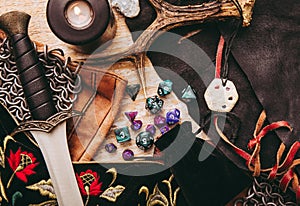 Fantasy role play board game still life concept. Background decorated with various character objects.