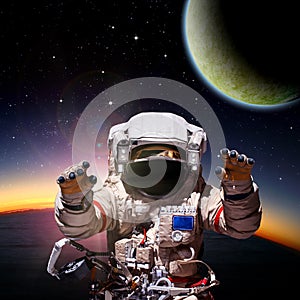 Fantasy scene of an Astronaut near an alien planet