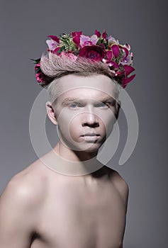 Fantasy. Styled Albino Man with Flowers