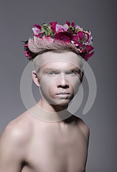 Fantasy. Styled Albino Man with Flowers photo