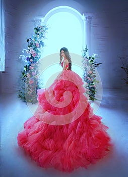 Fantasy woman princess in skirt lush pink neon bright color dress ball gown back rear view. Queen girl fashion model