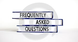 FAQ frequently asked questions symbol. Concept words FAQ frequently asked questions on books on a beautiful white table, white