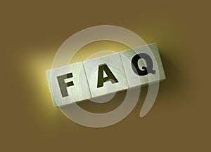 FAQ text on wooden cubes on red. Frequently Asked Questions. Business concept