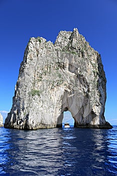 Faraglioni di Mezzo - one of three famous giant rocks, Capri island - Italy photo
