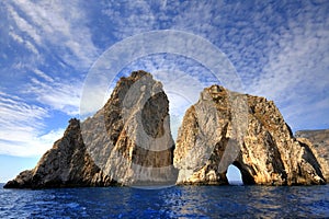 Faraglioni and cristal water in capri, summertime