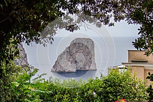 Faraglioni rocks visible in Capri, Italy