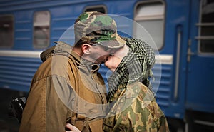 Farewell of wife with husband leaving on military service