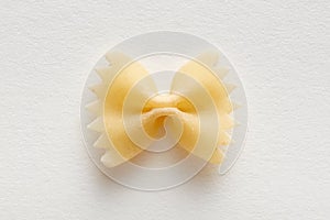Farfalle or bow tie pasta on white background