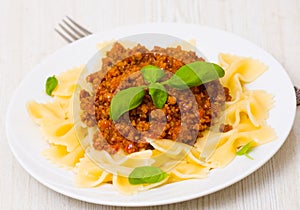 Farfalle pasta with bolognese sauce