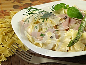 Farfalle pasta with ham