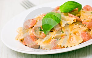 Farfalle pasta with sausage and cream sauce