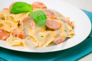 Farfalle pasta with sausage and cream sauce