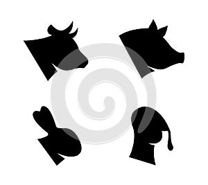 Farm animal head set. Pig, Turkey, Rabbit, Cow head silhouettes. Farm animal black icons isolated on white background.