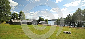 Farm buildings an meadow in cultural reserve area Gallejaur in Norrbotten, Sweden