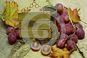 Farm drinks wicker bottle and grapes with label
