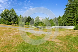 Farm driveway with wooden fence in Olympia, Washington state
