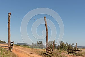 Farm entrance in the interior of Brazil and background images of the Serra Geral