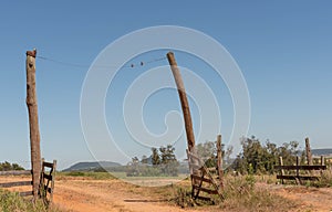 Farm entrance in the interior of Brazil and background images of the Serra Geral