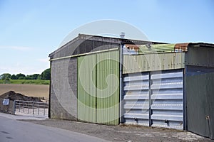 Farm and farmyard buildings in rural countryside