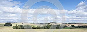 Farm and fields on high plane neer Cochem in german voreifel and wind turbines