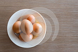 Farm fresh organic chicken eggs on plate with natural light