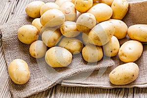 Farm fresh potatoes on a hessian sack