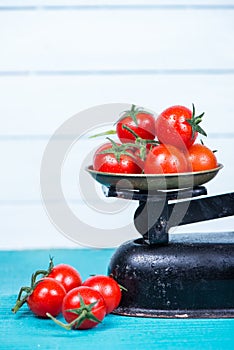 Farm fresh tomatoes on vintage scale