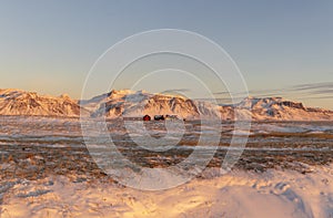 A Farm in Front of the volcano eyjafjallajÃ¶kull, Iceland, Europe in Winter