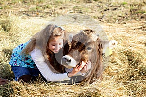 Farm girl and pet cow