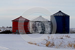 Farm grain bins in the winter.