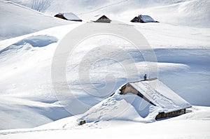 Farm house buried under snow