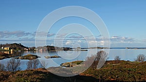 Farm houses on Islands from Storlauvoya bridge on the Atlantic road in More og Romsdal in Norway