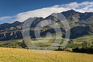 Farm in the Karoo with old rural houses and the swartberg mountains in south africa,