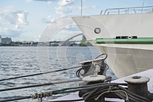 Farm laborer with moored ships on the berth in summer