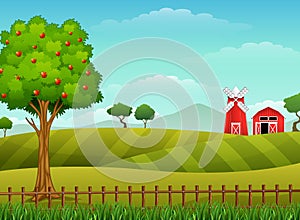 Farm landscape with shed and red windmill