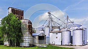 Farm landscape with silos and sheds