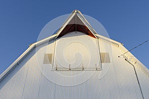 A farm in Northern Iowa and a metal barn