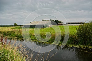 Farm outbuildings close to a river