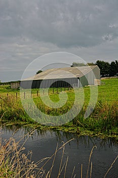 Farm outbuildings close to a river