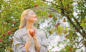 Farm produce organic natural product. Girl rustic style gather harvest garden autumn day. Farmer pretty blonde with