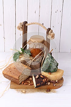 Farm products on white wooden background.