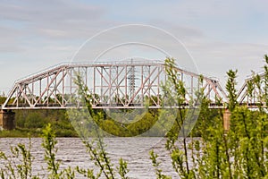 Farm railway bridge across the river