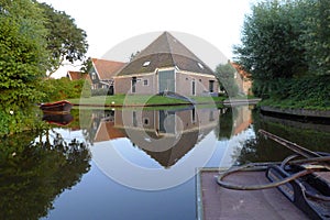 Farm reclecting on water