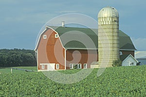 Farm with red barn and grain silo