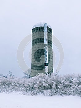 A farm silo on a wintery day